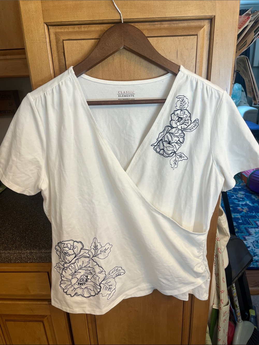Classic Elements White Short-Sleeve Wrap Top with Navy Floral Stitching